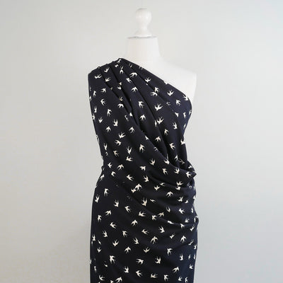 Alton - Navy Swallows Stretch Scuba Crepe Fabric Mannequin Wide Image from Patternsandplains.com