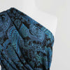 Alton - Turquoise Paisley Stretch Scuba Crepe Fabric Mannequin Close Up Image from Patternsandplains.com