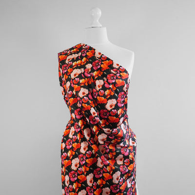 Antibes - Black Poppies Cotton Elastane Stretch Sateen Woven Fabric Mannequin Wide Image from Patternsandplains.com