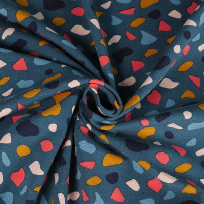Arizona - Petrol Shapes, Single Jersey Organic Cotton Elastane Fabric Detail Swirl Image from Patternsandplains.com