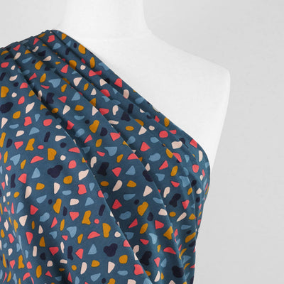 Arizona - Petrol Shapes, Single Jersey Organic Cotton Elastane Fabric Mannequin Close Up Image from Patternsandplains.com