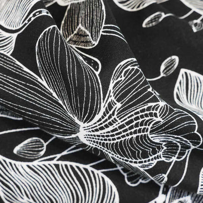 Capri - Black Etched Leaves Viscose Woven Fabric Feature Image from Patternsandplains.com