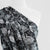 Capri - Black Etched Leaves Viscose Woven Fabric Mannequin Close Up Image from Patternsandplains.com