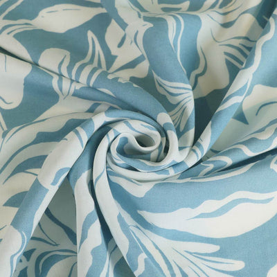 Capri - Stone Blue Foliage Viscose Woven Fabric Detail Swirl Image from Patternsandplains.com