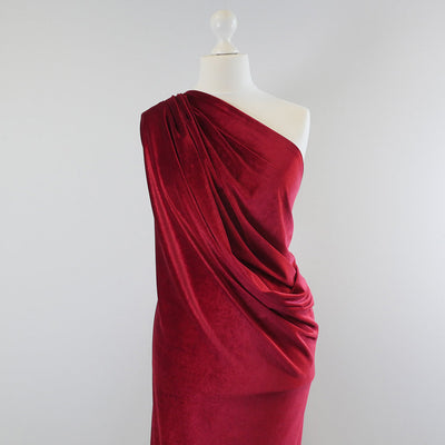 Carlotta Wine Red Stretch Panne Velvet Jersey Fabric from John Kaldor Mannequin Wide Image from Patternsandplains.com