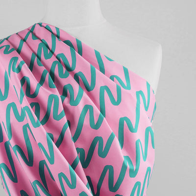 Fine Poplin - Light Pink Making Waves Cotton Woven Fabric by Nerida Hansen Mannequin Close Up Image from Patternsandplains.com