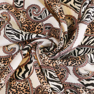 Linz - Cream Wild Paisley Viscose Woven Twill Fabric Detail Swirl Image from Patternsandplains.com