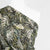 Linz - Green Wild Forest Viscose Woven Twill Fabric Mannequin Close Up Image from Patternsandplains.com