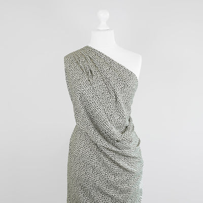 Linz - Light Cream Ds Viscose Woven Twill Fabric Mannequin Wide Image from Patternsandplains.com