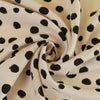 Linz - Parchment Cream Spotty Viscose Woven Twill Fabric Detail Swirl Image from Patternsandplains.com