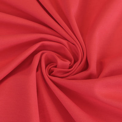 Milan - Coral Pink Viscose Rich Ponte de Roma Fabric Detail Swirl Image from Patternsandplains.com