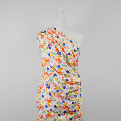 Monteray - Ecru Rainbow Bubbles Cotton Elastane Single Jersey Fabric Mannequin Wide Image from Patternsandplains.com