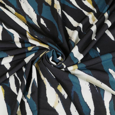 Portia - Teal and Lime Fracture Stretch Jersey Fabric from John Kaldor Detail Swirl Image from Patternsandplains.com