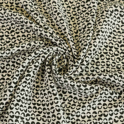 Linz - Light Cream Ds Viscose Woven Twill Fabric Detail Swirl Image from Patternsandplains.com
