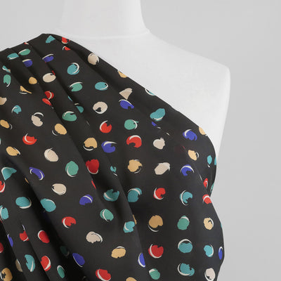 Liza 111766 - Black Sweet Spot Georgette Woven Fabric from John Kaldor Mannequin Close Up Image from Patternsandplains.com