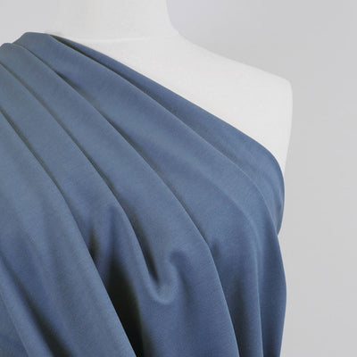 Milan - Jeans Blue Viscose Rich Ponte de Roma Fabric Mannequin Close Up Image from Patternsandplains.com