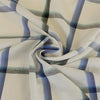 Nairn - Blue Yarn Dyed Asymmetrical Plaid Woven Fabric Detail Swirl Image from Patternsandplains.com
