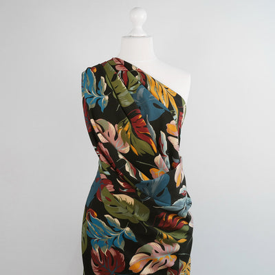 Alton - Multi Lucious Leaves Stretch Scuba Crepe Fabric Mannequin Wide Image from Patternsandplains.com