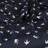 Alton - Navy Swallows Stretch Scuba Crepe Fabric Feature Image from Patternsandplains.com