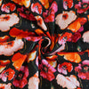 Antibes - Black Poppies Cotton Elastane Stretch Sateen Woven Fabric Detail Swirl Image from Patternsandplains.com