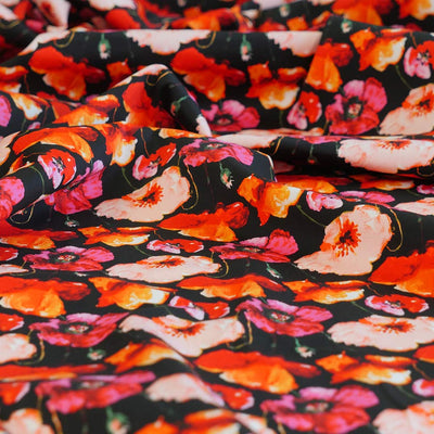 Antibes - Black Poppies Cotton Elastane Stretch Sateen Woven Fabric Feature Image from Patternsandplains.com