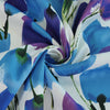 Antibes - Blue Tulips Cotton Elastane Stretch Sateen Woven Fabric Detail Swirl Image from Patternsandplains.com