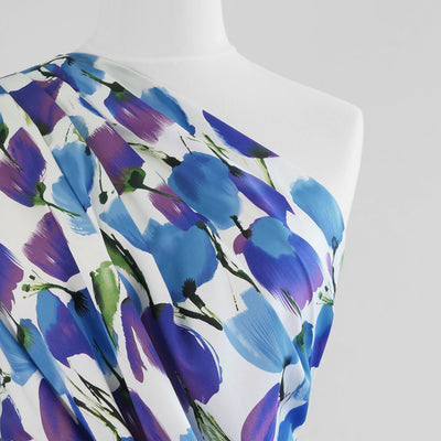 Antibes - Blue Tulips Cotton Elastane Stretch Sateen Woven Fabric Mannequin Close Up Image from Patternsandplains.com