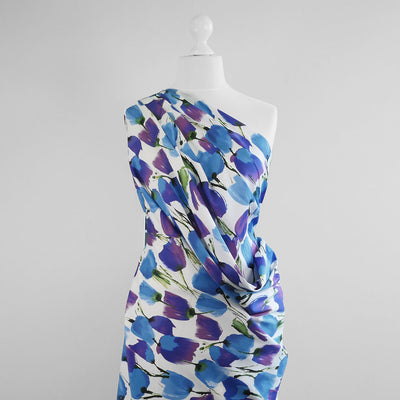 Antibes - Blue Tulips Cotton Elastane Stretch Sateen Woven Fabric Mannequin Wide Image from Patternsandplains.com