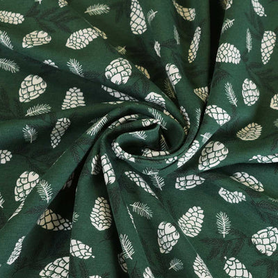 Arizona - Bottle Green Pine Cones, Single Jersey Cotton Elastane Print Fabric Detail Swirl Image from Patternsandplains.com