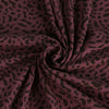 Arizona - Dark Purple Dots, Single Jersey Organic Cotton Elastane Fabric Detail Swirl Image from Patternsandplains.com