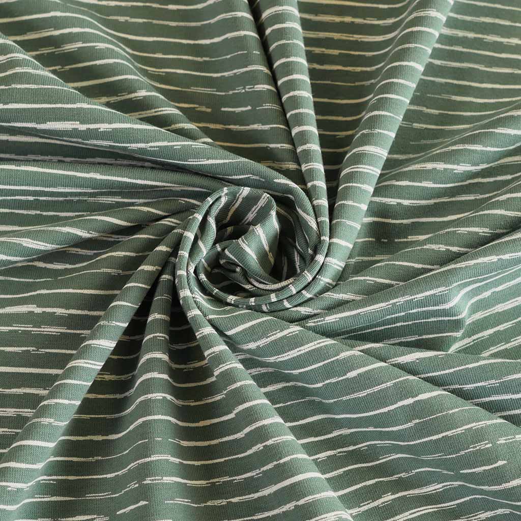 Arizona - Pistachio Green Sketch Stripe, Single Jersey Cotton Elastane Print Fabric Detail Swirl Image from Patternsandplains.com