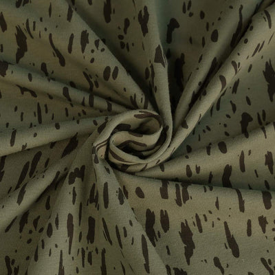 Arizona - Sage Green Dashes, Single Jersey Organic Cotton Elastane Fabric Detail Swirl Image from Patternsandplains.com