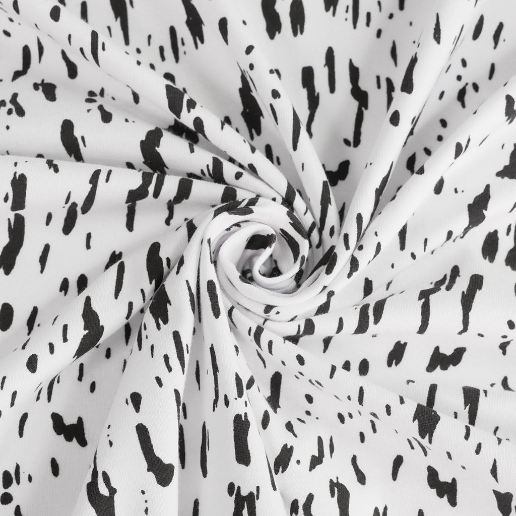 Arizona - White Dashes, Single Jersey Organic Cotton Elastane Fabric Detail Swirl Image from Patternsandplains.com