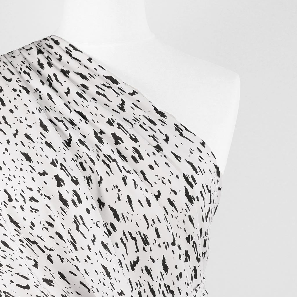 Arizona - White Dashes, Single Jersey Organic Cotton Elastane Fabric Mannequin Close Up Image from Patternsandplains.com