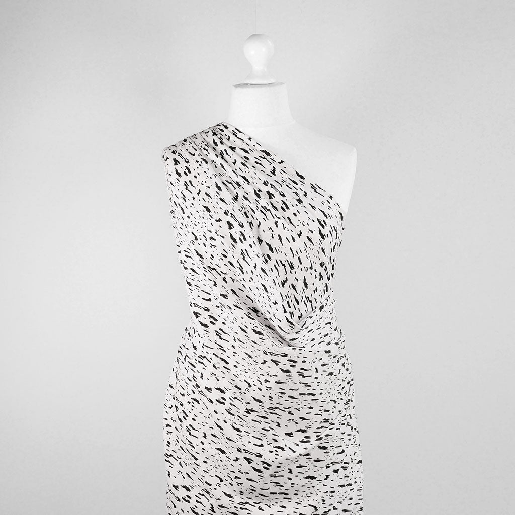 Arizona - White Dashes, Single Jersey Organic Cotton Elastane Fabric Mannequin Wide Image from Patternsandplains.com