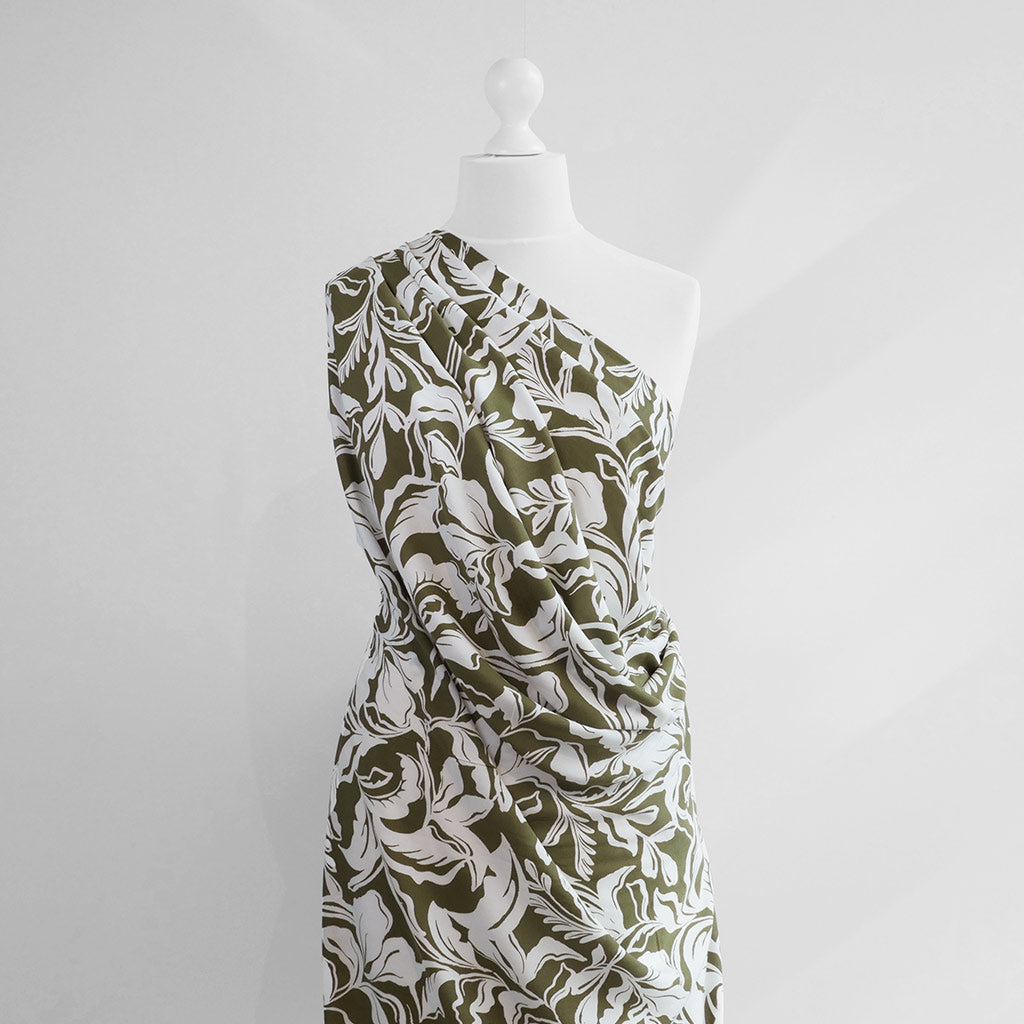 Capri - Dark Moss Green Foliage Viscose Woven Fabric Mannequin Wide Image from Patternsandplains.com