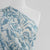 Capri - Stone Blue Foliage Viscose Woven Fabric Mannequin Close Up Image from Patternsandplains.com