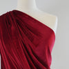 Carlotta Wine Red Stretch Panne Velvet Jersey Fabric from John Kaldor Mannequin Closeup Image from Patternsandplains.com