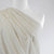 Carolina - Light Cream, Geometric Embroidered Cotton Woven Fabric Mannequin Close Up Image from Patternsandplains.com