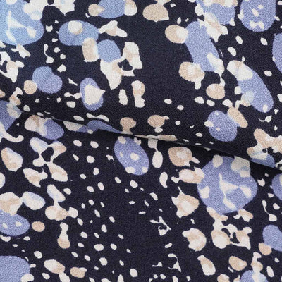 Cassis - Navy Larva Spots Viscose Crepe Woven Fabric Feature Image from Patternsandplains.com