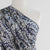 Cassis - Navy Larva Spots Viscose Crepe Woven Fabric Mannequin Close Up Image from Patternsandplains.com