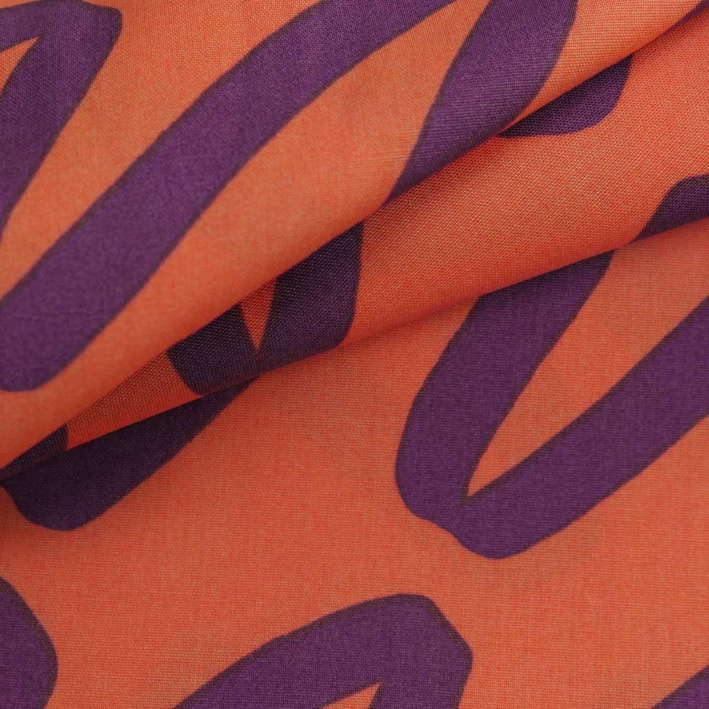 Fine Poplin - Coral Making Waves Cotton Woven Fabric by Nerida Hansen Feature Image from Patternsandplains.com