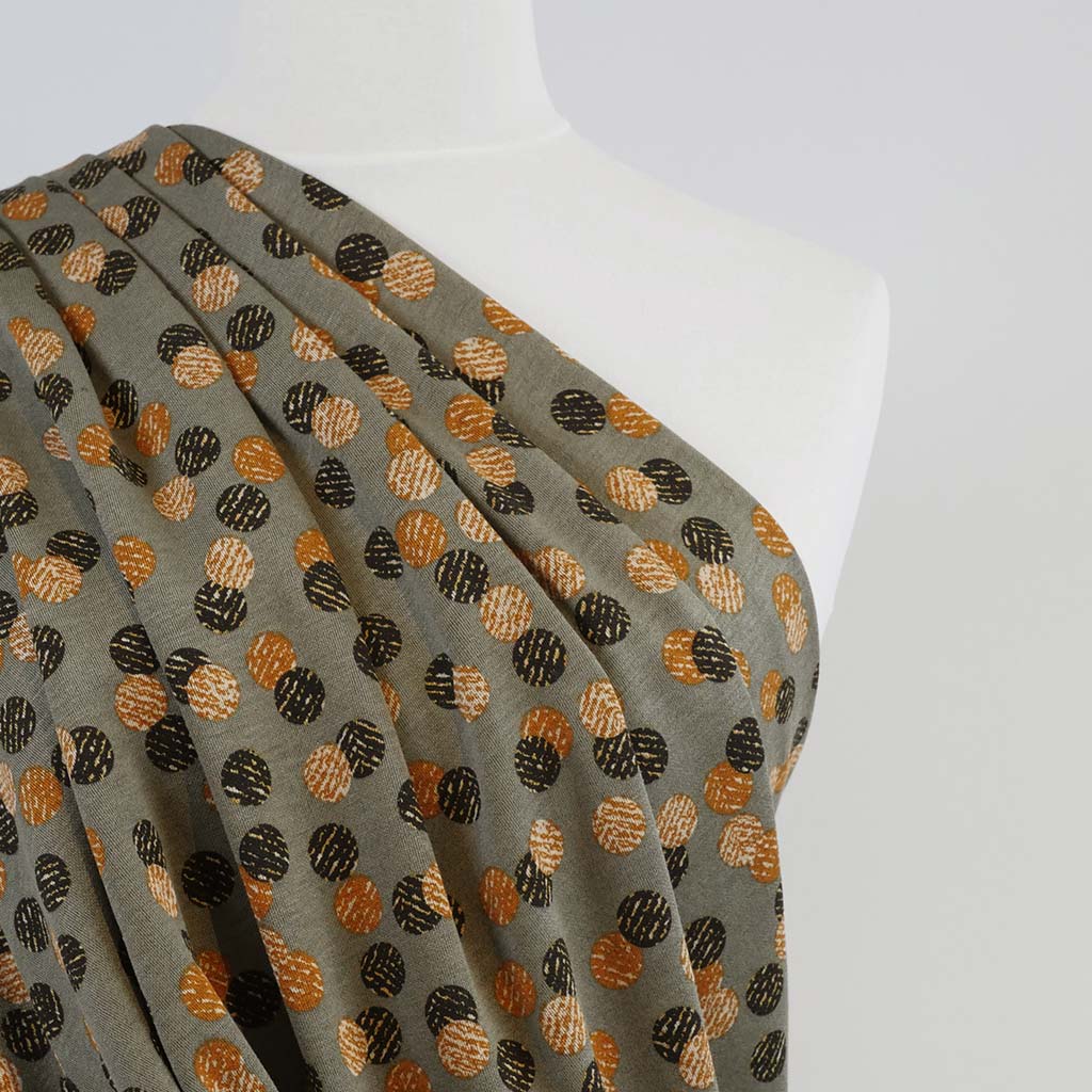 Florence - Green Buttons, Ponte de Roma Fabric Mannequin Close Up Image from Patternsandplains.com