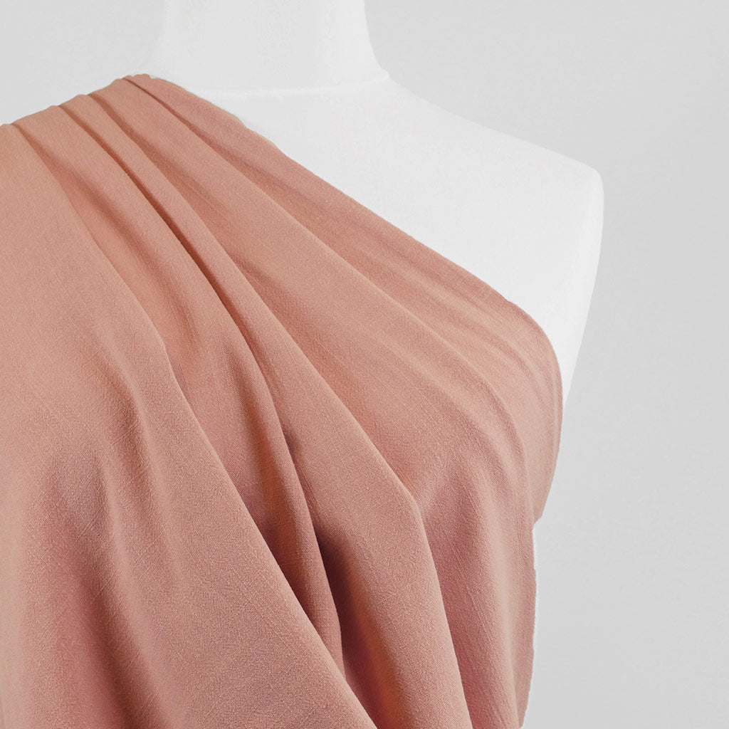 Liege - Melon Pink Viscose Linen Silky Noil Woven Fabric Mannequin Close Up Image from Patternsandplains.com