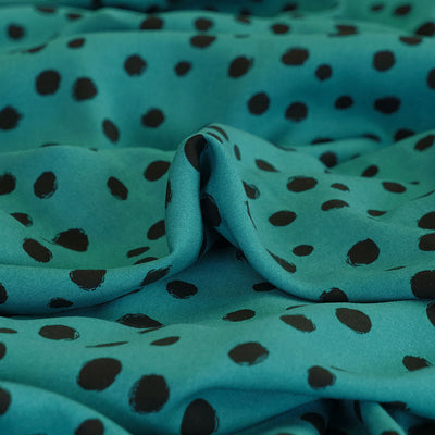 Linz - Almost Turquoise Spotty Viscose Woven Twill Fabric Feature Image from Patternsandplains.com