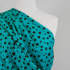 Linz - Almost Turquoise Spotty Viscose Woven Twill Fabric Mannequin Close Up Image from Patternsandplains.com