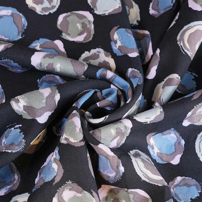 Linz - Blue Planets Viscose Woven Twill Fabric Detail Swirl Image from Patternsandplains.com