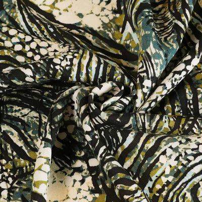 Linz - Green Wild Forest Viscose Woven Twill Fabric Detail Swirl Image from Patternsandplains.com
