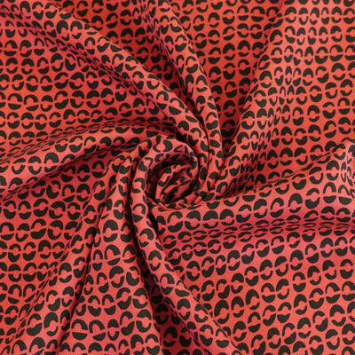 Linz - Jasper Red Ds Viscose Woven Twill Fabric Detail Swirl Image from Patternsandplains.com