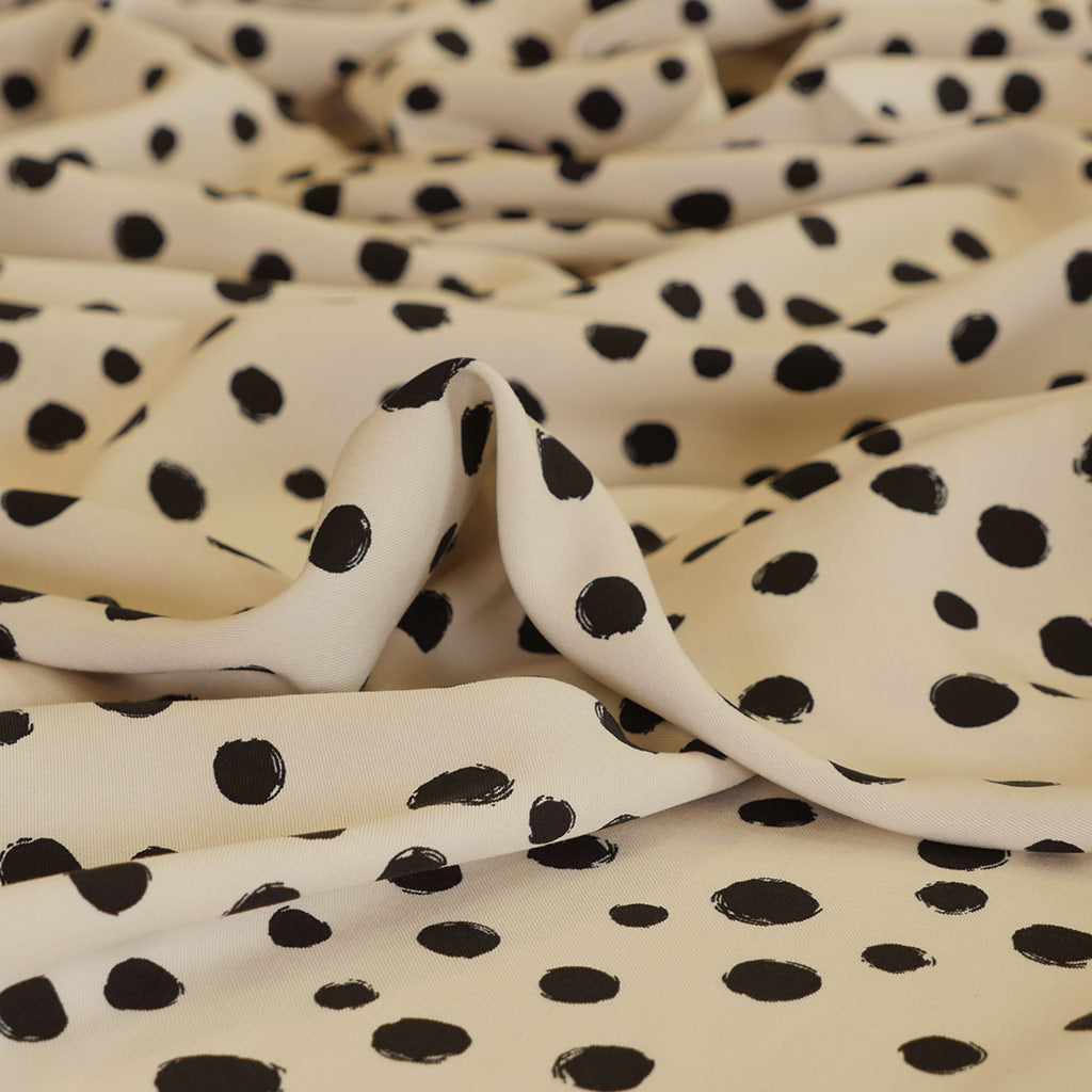 Linz - Parchment Cream Spotty Viscose Woven Twill Fabric Feature Image from Patternsandplains.com